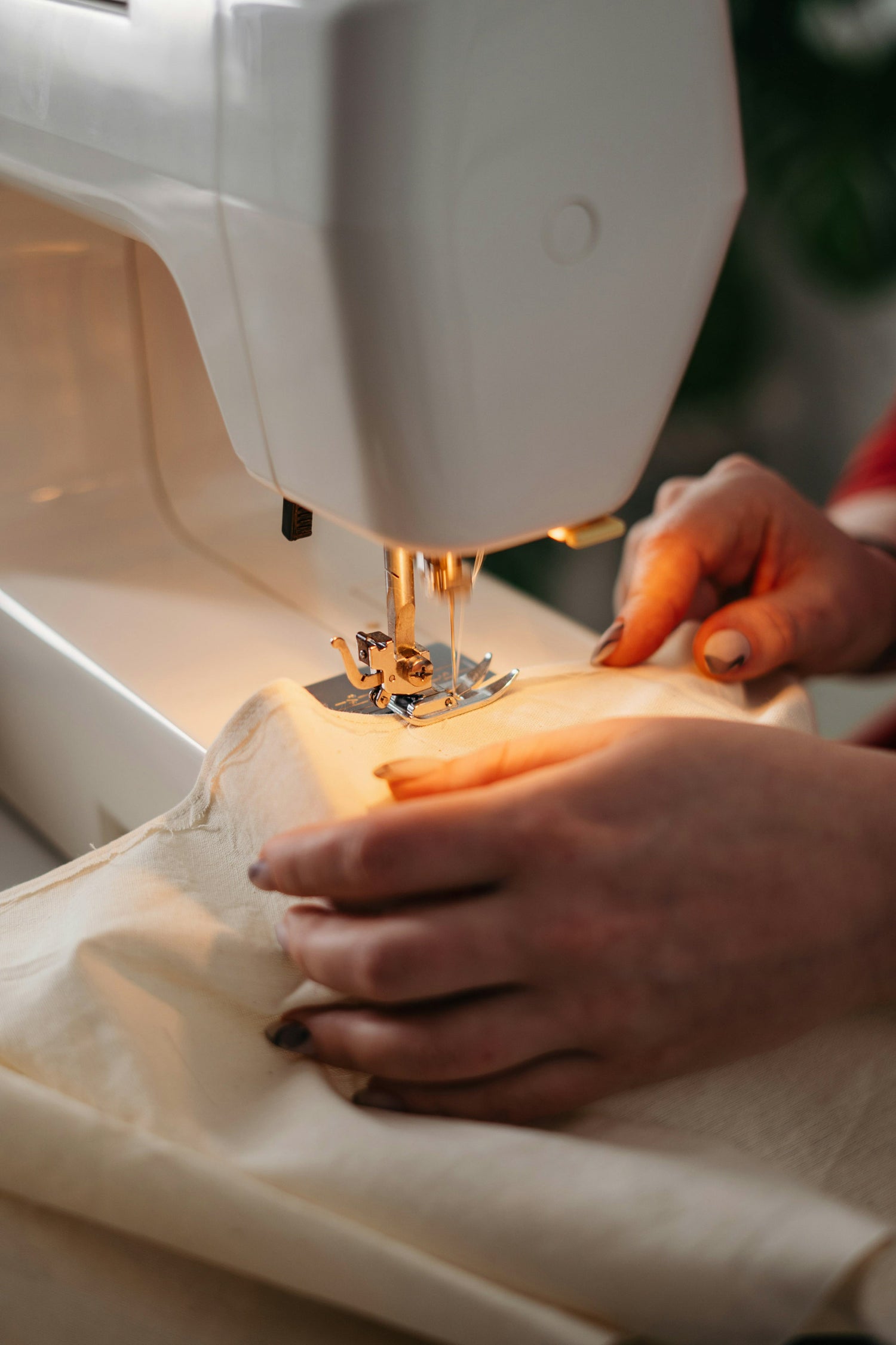 Ethical manufacturing process: Hand-sewing swimwear, highlighting Mālie the label's commitment to ethical labor practices